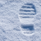 foto - stopa boty ve sněhu